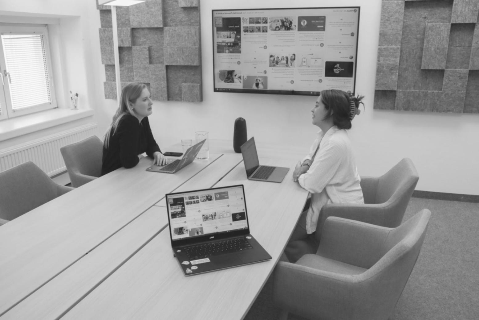 Business owner reviewing company structure documents with advisor